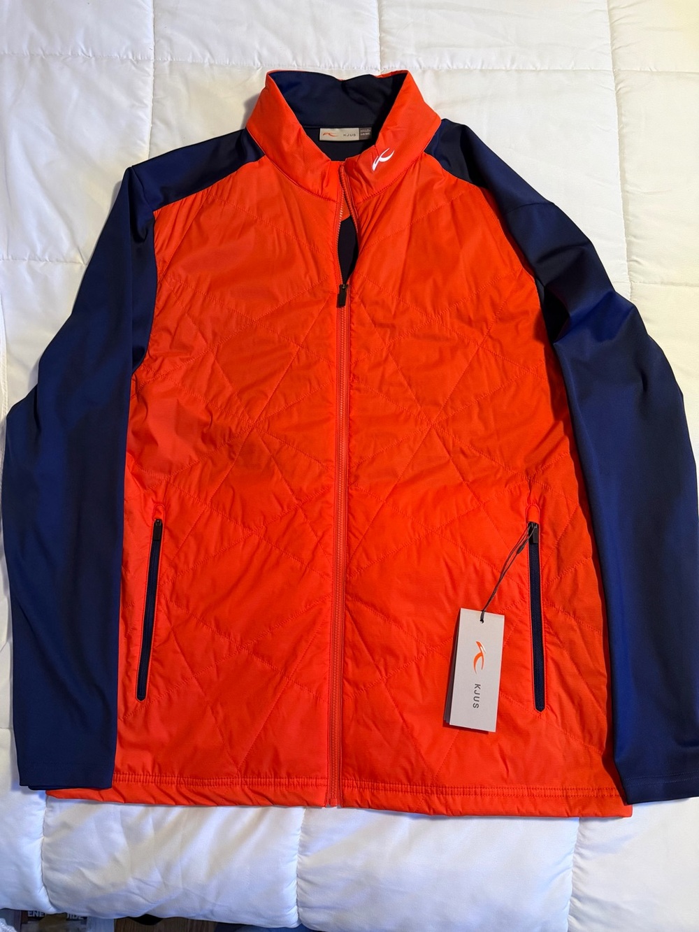 Kjus Men's Orange Quilted Performance Jacket with Navy Sleeves